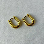 Nirvana - Oval Huggies Earrings - 18k Gold PVD -  - LUMENAURA