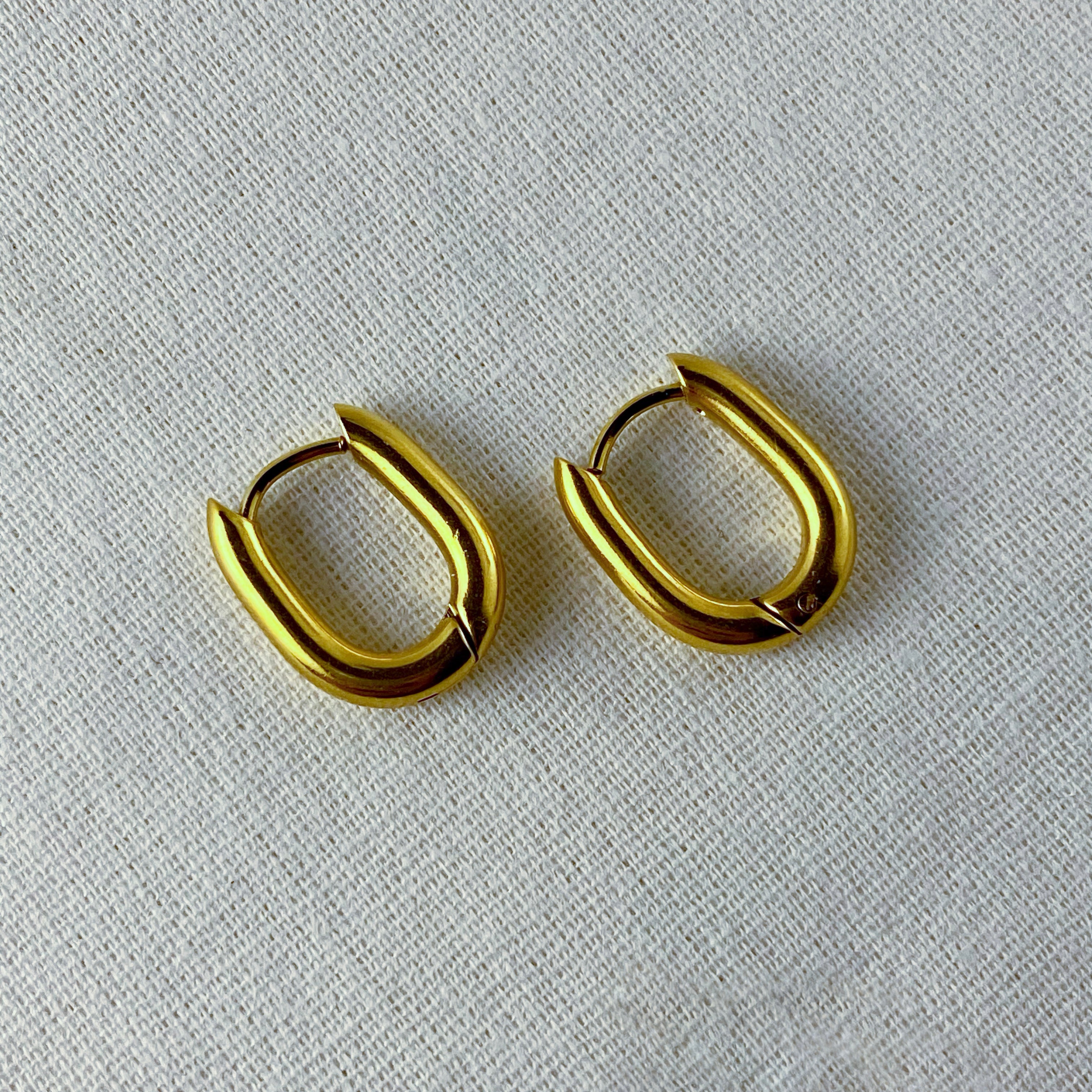 Nirvana - Oval Huggies Earrings - 18k Gold PVD - LUMENAURA  LUMENAURA