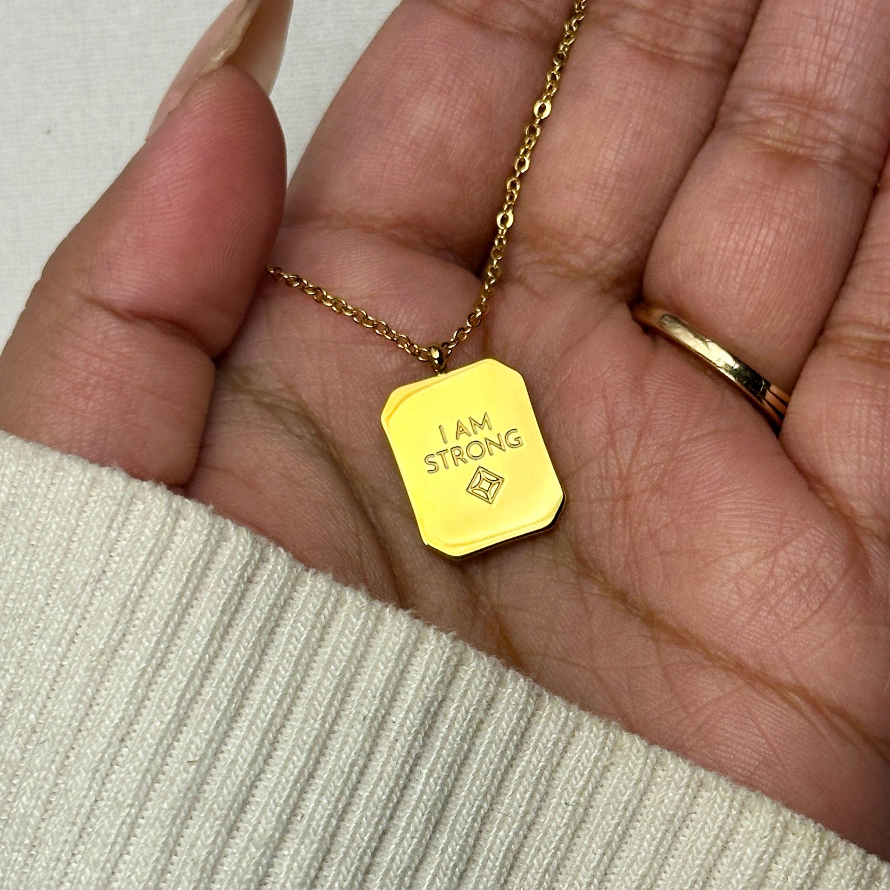 Kamal - "I AM STRONG" Reversible Necklace - 18k Gold PVD - LUMENAURA  LUMENAURA