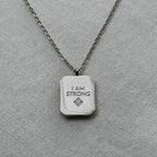 Kamal - "I AM STRONG" Reversible Necklace - Stainless Steel Silver -  - LUMENAURA
