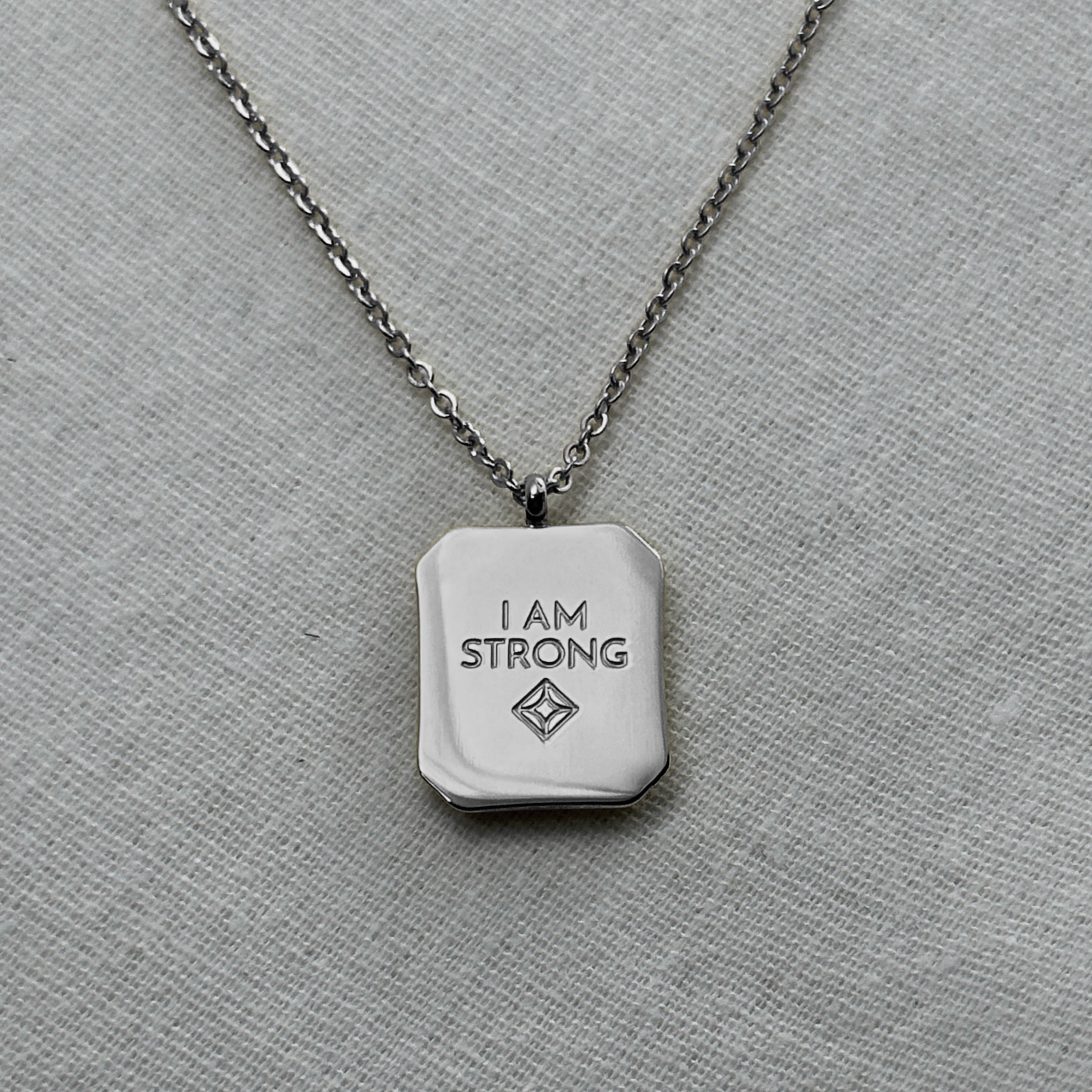 Kamal - "I AM STRONG" Reversible Necklace - Stainless Steel Silver - LUMENAURA  LUMENAURA